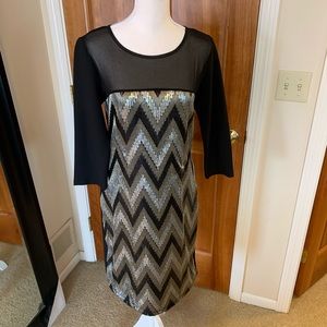 Beautiful LBISSE black dress with sequin detail. L